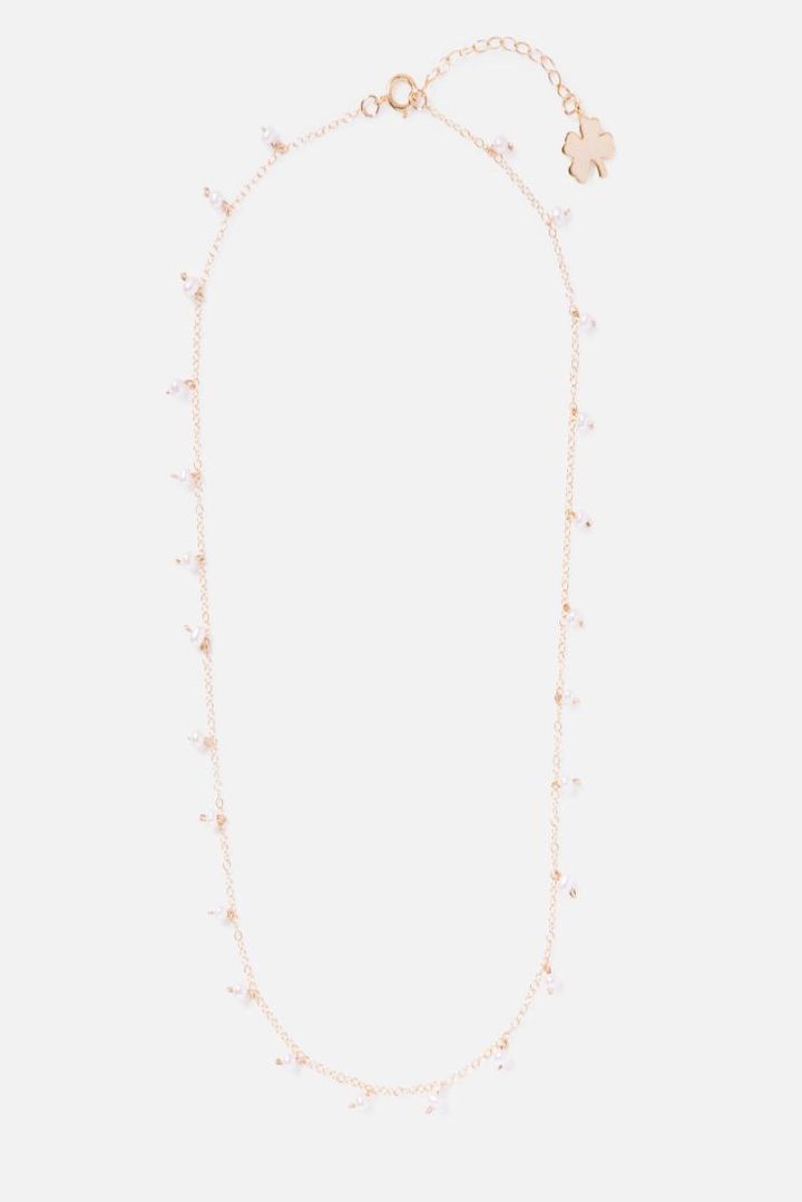 gold sprinkled necklace with clover