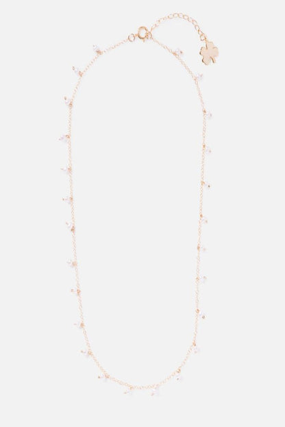 gold sprinkled necklace with clover